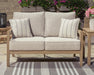 Hallow Creek Outdoor Loveseat with Cushion - CasaBella Furniture (San Antonio, TX)