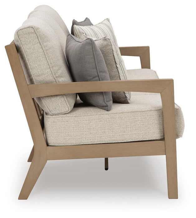 Hallow Creek Outdoor Sofa with Cushion - CasaBella Furniture (San Antonio, TX)