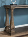 Johnelle Sofa Table - CasaBella Furniture (San Antonio, TX)